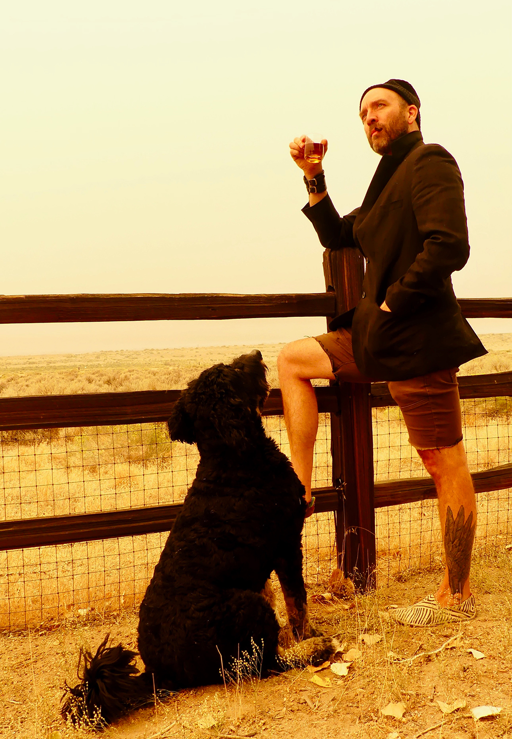 John E. Jeffrey with a dog, a dram, a cigar, and a lot of sepia